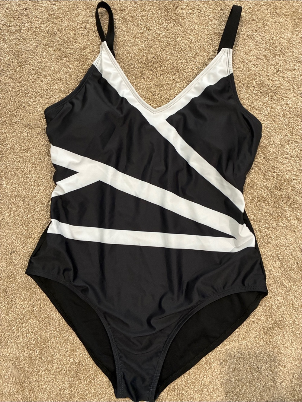 Black & White V‑Neck One‑Piece Swimsuit with Graphic Stripe